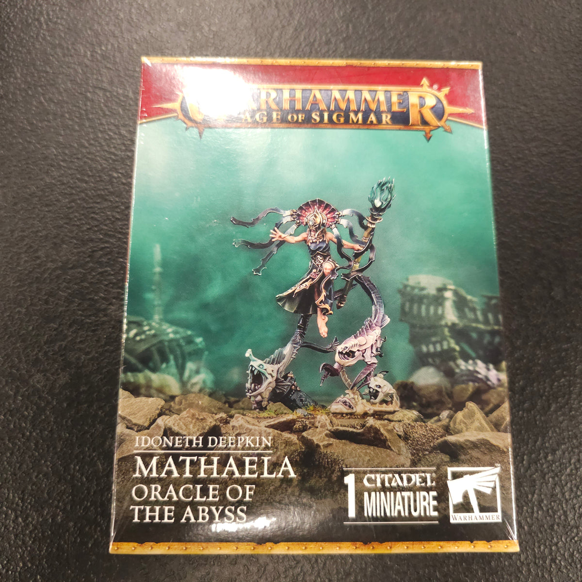 Actual box of Mathaela, Oracle of the Abyss — lot 012