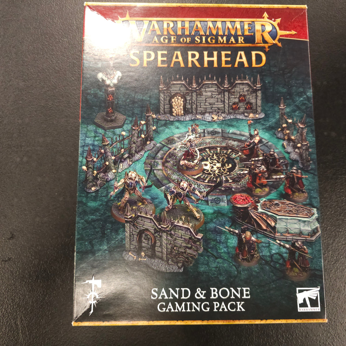 Actual box of Spearhead: Sand & Bone Gaming Pack — lot 033