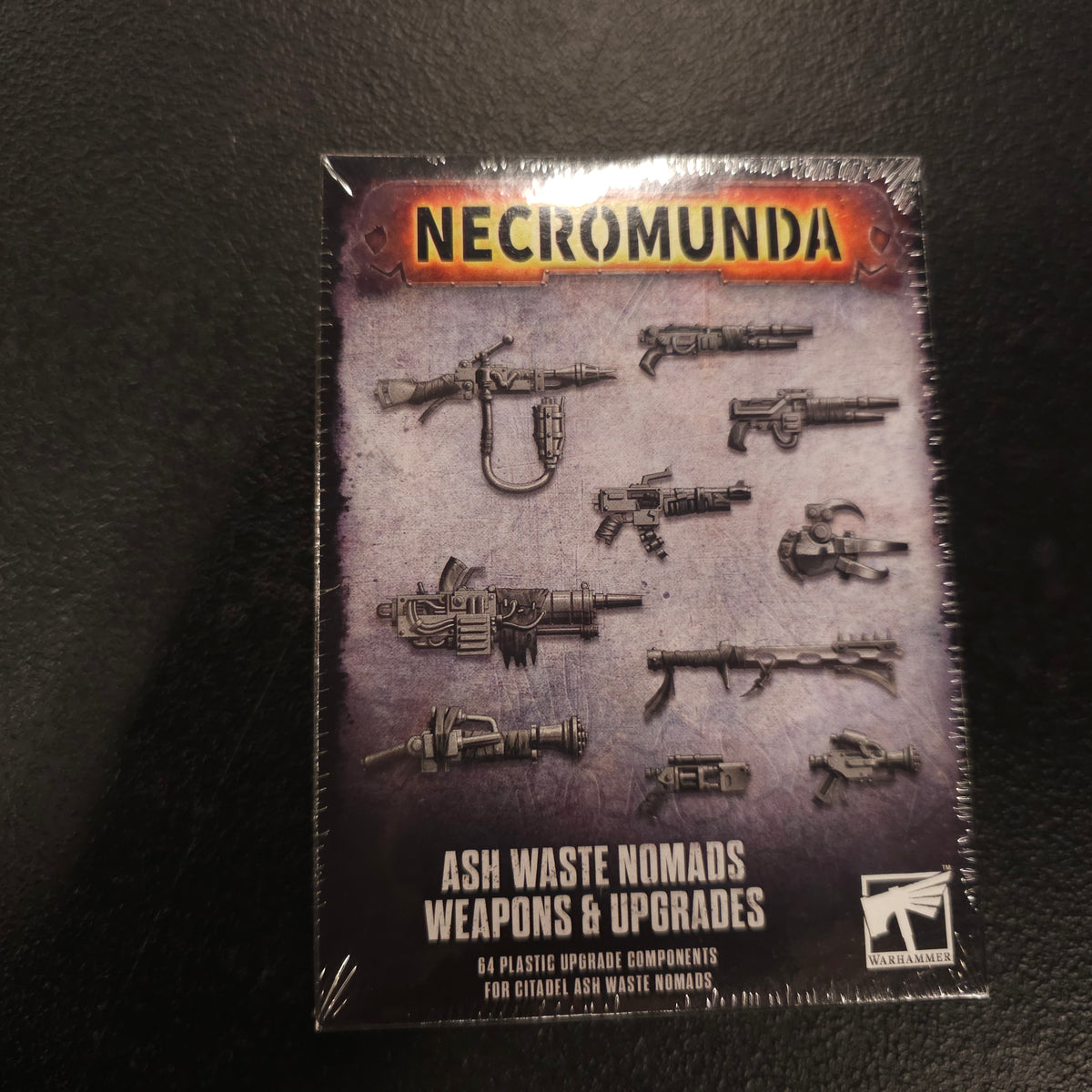 Ash Waste Nomads Weapons & Upgrades - actual retail packaging, front view