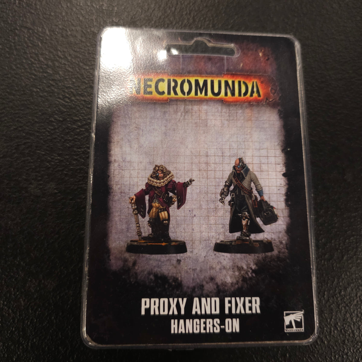 Proxy and Fixer Hangers-on - actual retail packaging, front view