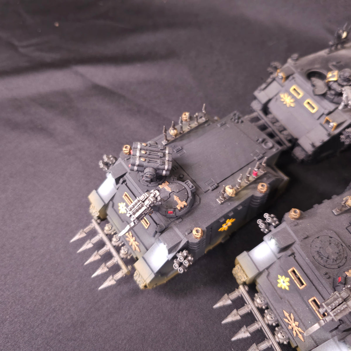 Painted Black-and-Gold Rhino Transport Group - detail view 4