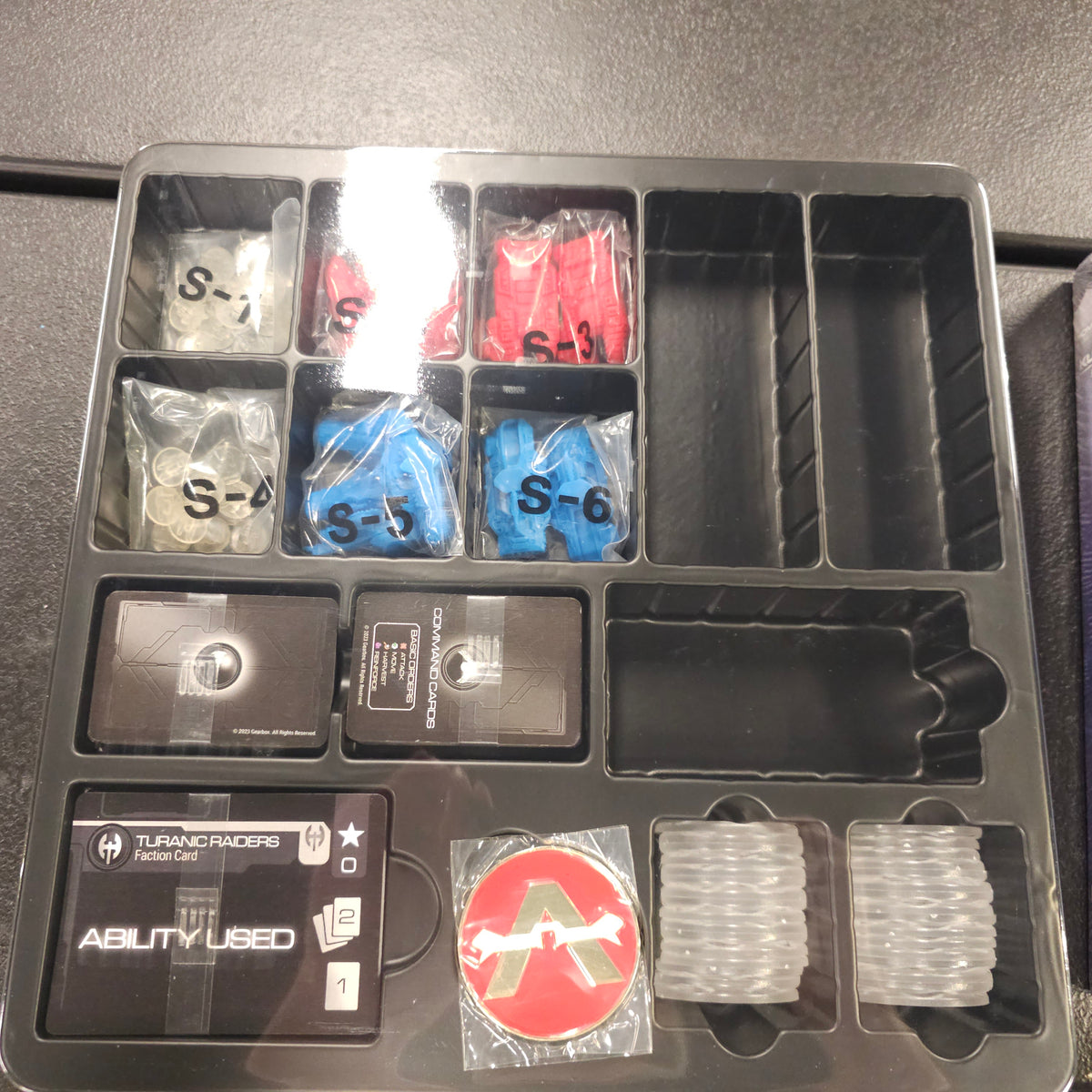 Open Homeworld Fleet Command Scout box showing bagged components and trays