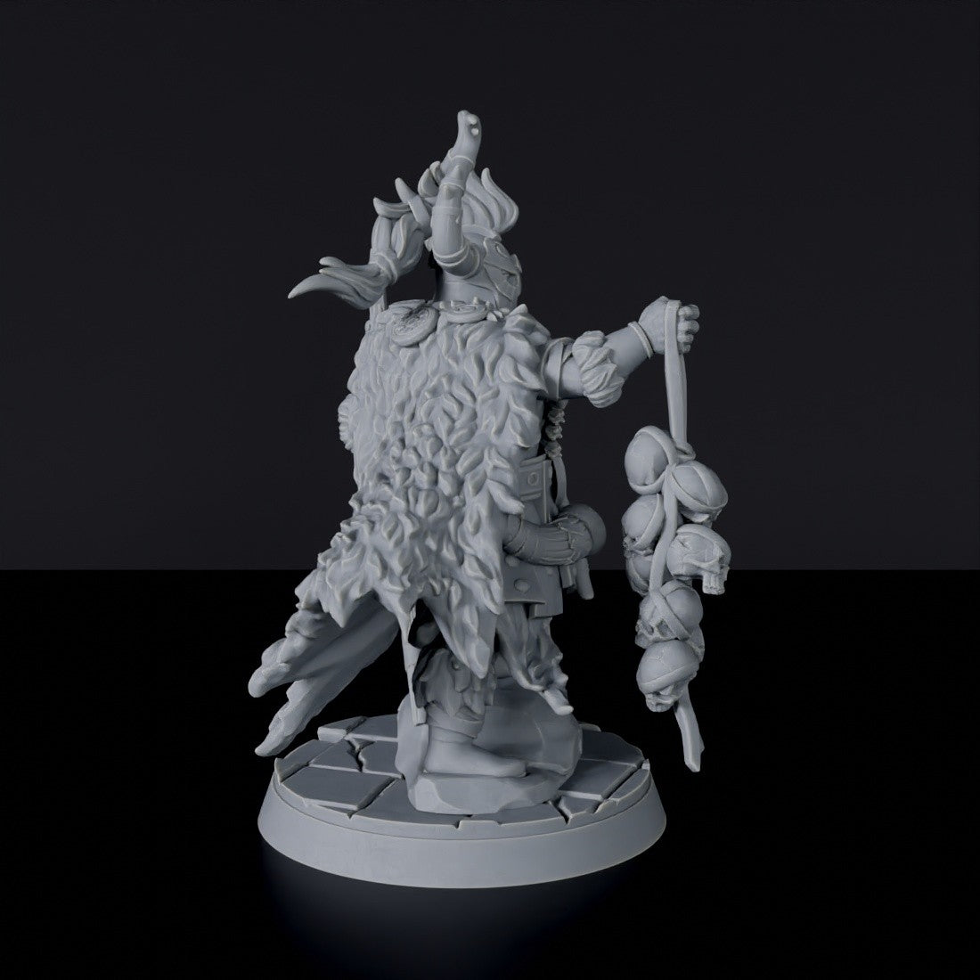 Fantasy miniature of barbarian Tahnar with sword and axe for Bloodfields tabletop RPG game