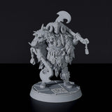 Fantasy miniatures of Gyratos barbarian warrior with axes and helmet for Roaming Barbarians army