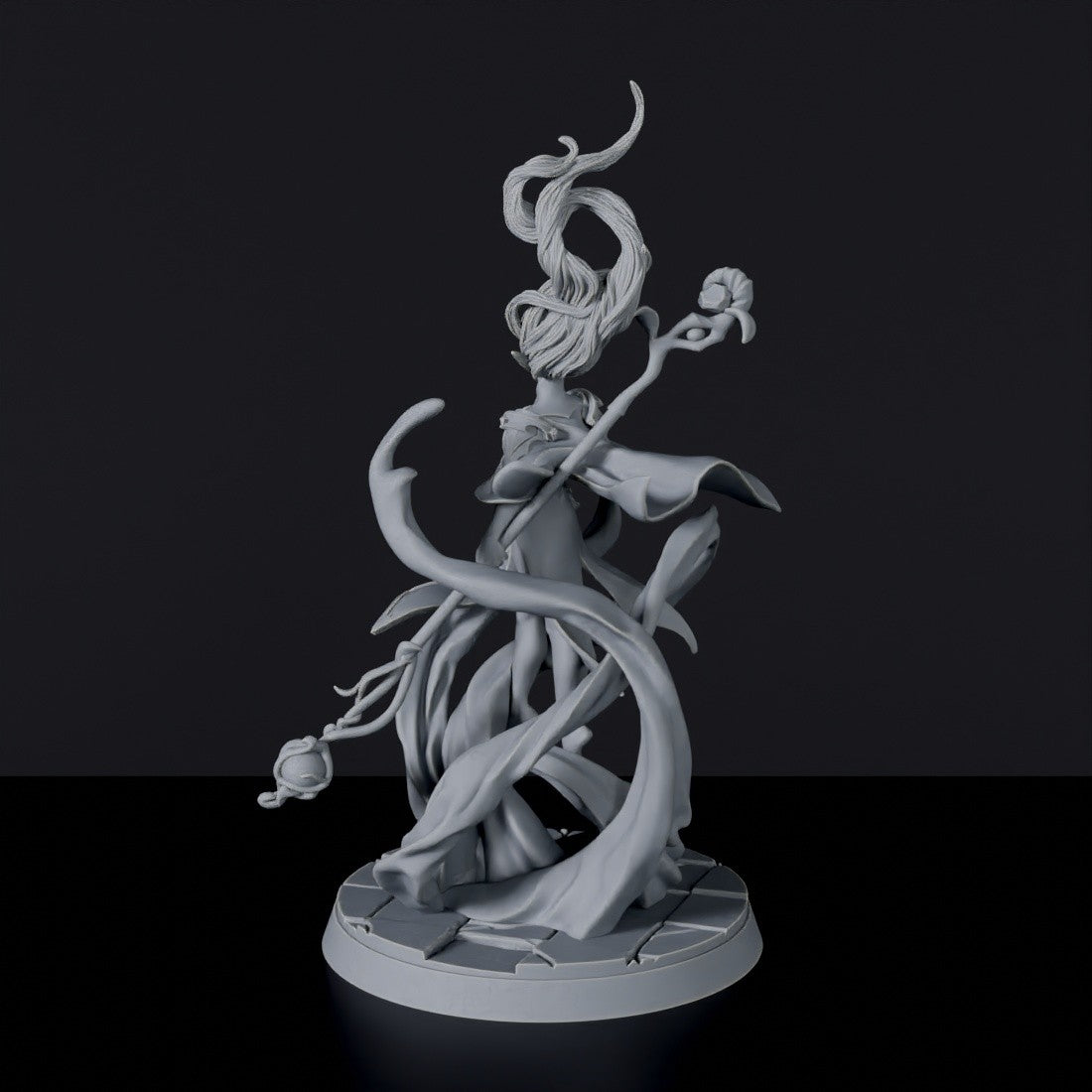 Fantasy miniature of female elf water wizard Linessa Waterfront with staff for Bloodfields tabletop RPG game