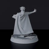 Fantasy miniature of Girflet the Adept knight priest with tome and cloak for Bloodfields tabletop RPG game