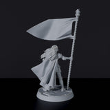 Fantasy miniature of female knight with flag Kathrina Bright for Bloodfields tabletop RPG game