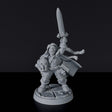 Miniature of Dwarf Female Paladin with sword and helmet - dedicated warrior set to army for fantasy tabletop RPG games