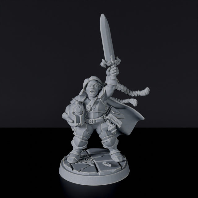 Miniature of Dwarf Female Paladin with sword and helmet - dedicated warrior set to army for fantasy tabletop RPG games