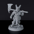 Miniature of Dwarf Female Barbarian with axe and skull helmet - dedicated warrior set to army for fantasy tabletop RPG games