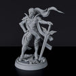 Miniature of Human Female Paladin with sword and armor for fantasy tabletop role-playing games