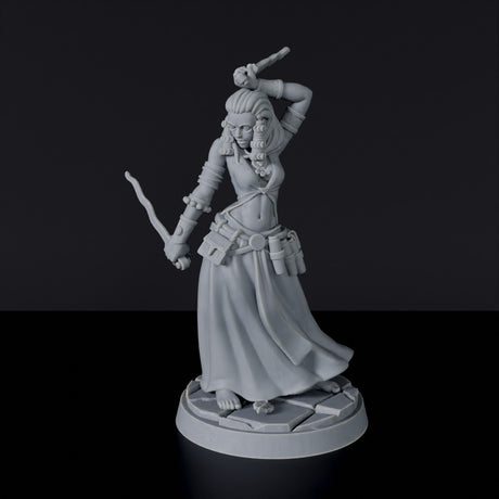 Miniature of Human Female Rogue / Bard - thief with knives and cloak for fantasy tabletop role-playing games