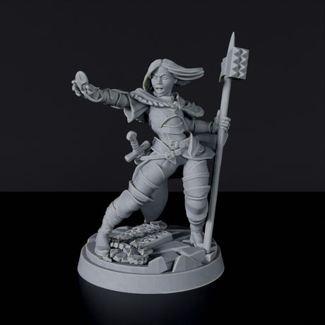 Miniature of Human Female Cleric with hammer and cloak for fantasy tabletop role-playing games