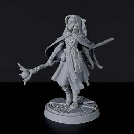 Miniature of Human Female Druid with staff and cloak for fantasy tabletop role-playing games