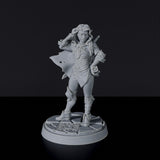 Miniature of Elf Female Warrior with sword and backpack for fantasy tabletop role-playing games