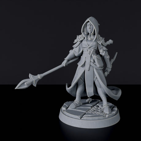 Miniature of magic Human Female Wizard with staff, cloak and knive for fantasy tabletop role-playing games