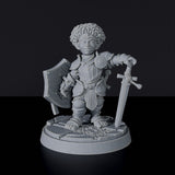 Miniature of Gnome Female Warrior with sword, shield and armor for fantasy tabletop role-playing games