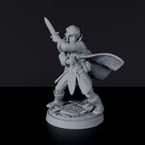 Miniature of Human Male Rogue - thief with knives and cloak for fantasy tabletop role-playing games